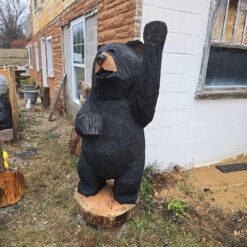 Waving bear chainsaw carving