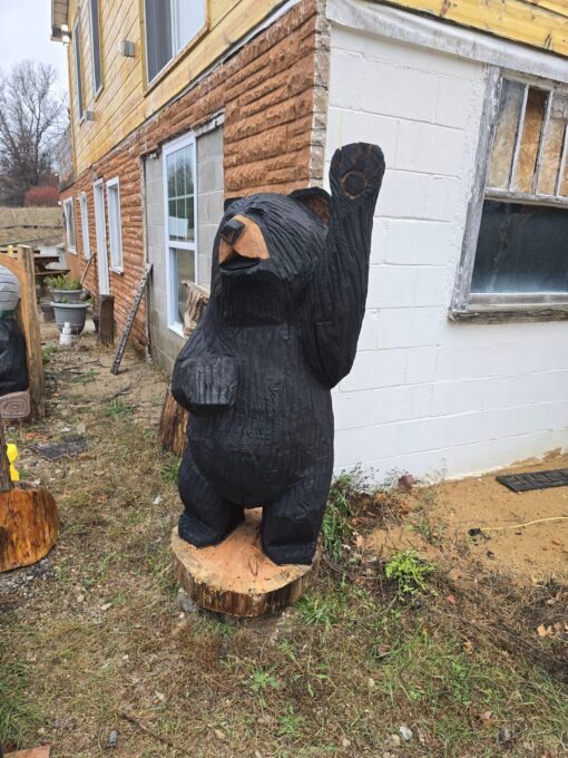 Waving bear chainsaw carving